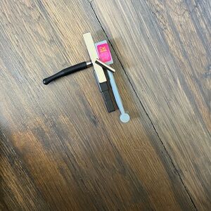 Assorted Makeup Tools with Pink 'Cat Eyes' Label